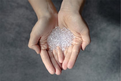 Plastic pellets in hands