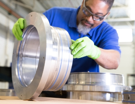 Person working at machine part