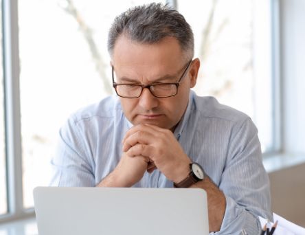 Person looking at laptop screen